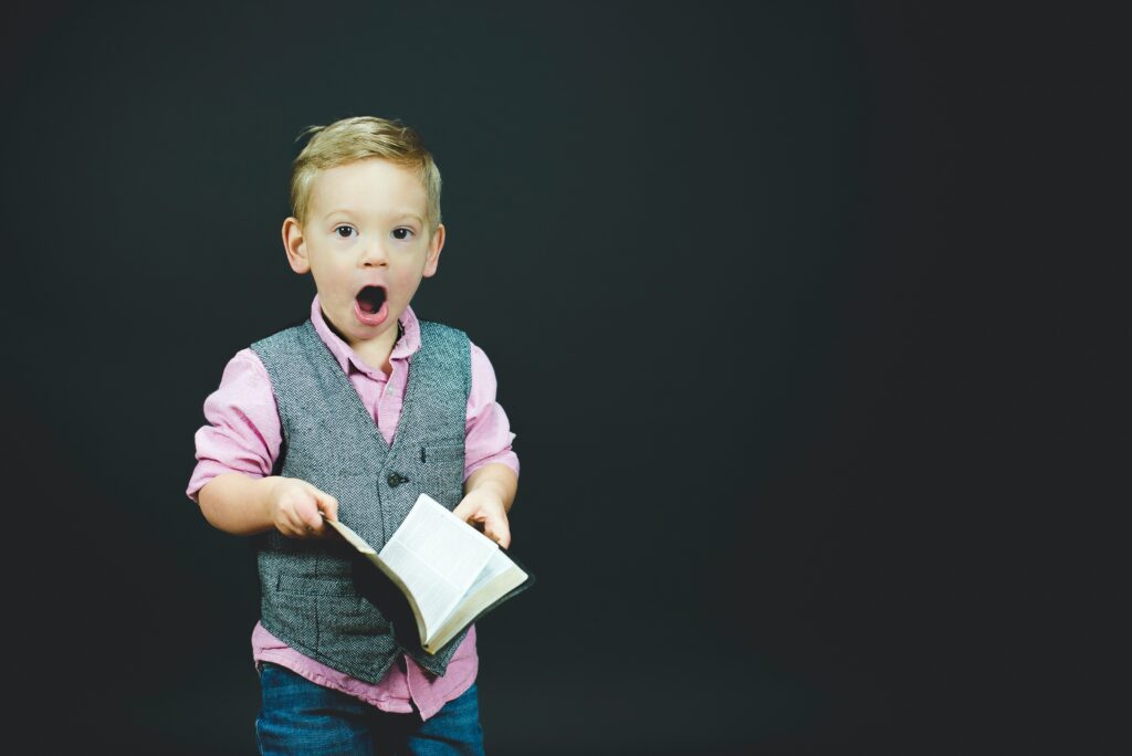 junior surprised when reading a book