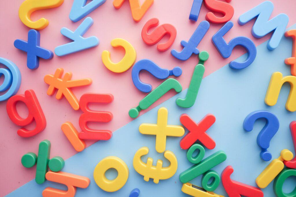 A bunch of colorful letters on a table